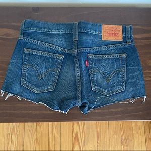 Levi’s denim cutoff shorts — super short, flattering fit.